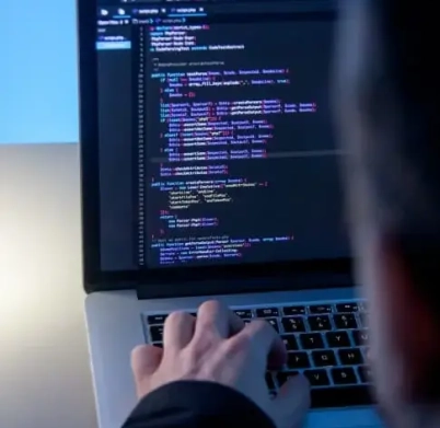 programmer-working-laptop-computer-office-studio-1-1-1-402x391